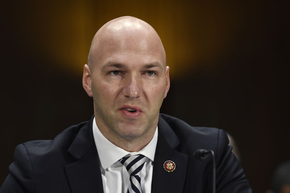 FILE - In this Feb. 11, 2020, file photo, Rep. Anthony Gonzalez, R-Ohio, speaks during a Senate Commerce subcommittee hearing on Capitol Hill in Washington, on intercollegiate athlete compensation. Gonzalez, the first of 10 House Republicans who voted to impeach former President Donald Trump for his role in inciting the Jan. 6 insurrection at the Capitol, announced Thursday, Sept. 16, 2021, he will not seek re-election next year. (AP Photo/Susan Walsh, File)