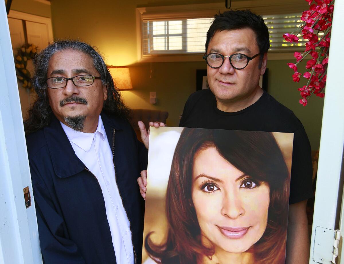 Among the friends and "Stand and Deliver" castmates pushing for Vanessa Marquez to be remembered in this year's Oscars In Memoriam tribute are actors Daniel Villarreal, left, and Patrick Baca, holding a photo of Marquez.