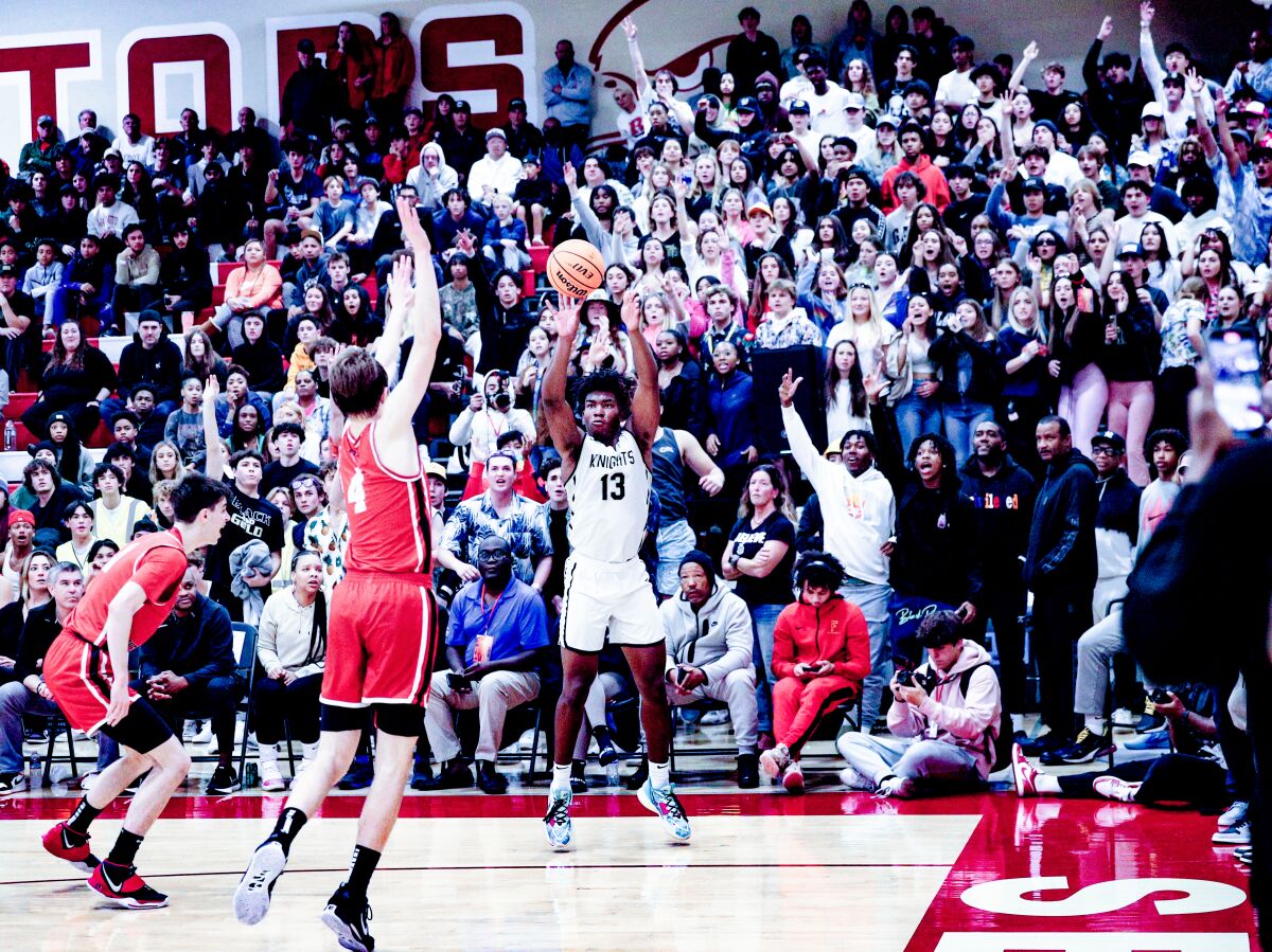Will Smith of Bishop Montgomery launches a key three-point attempt as Knights fans prepare to erupt against Harvard-Westlake.