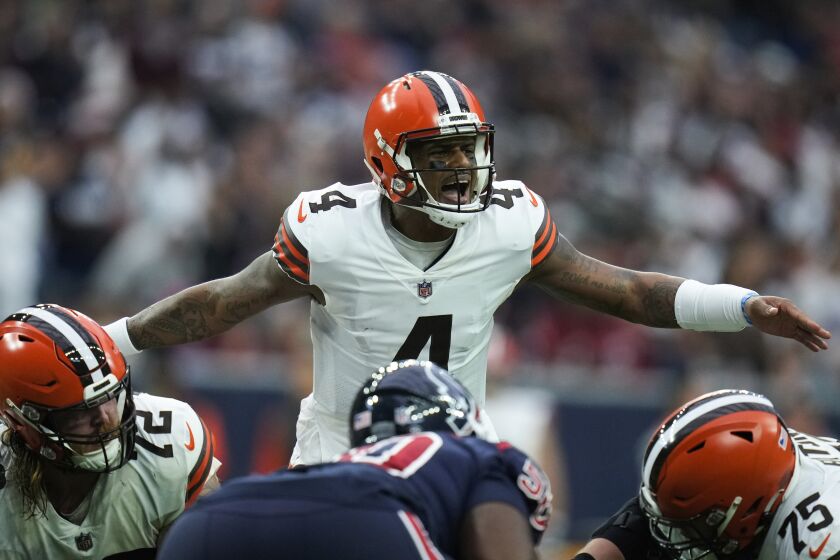 Cleveland Browns quarterback Deshaun Watson (4) calls a play at the line during the first half of an NFL football game between the Cleveland Browns and Houston Texans in Houston, Sunday, Dec. 4, 2022,. (AP Photo/Eric Christian Smith)