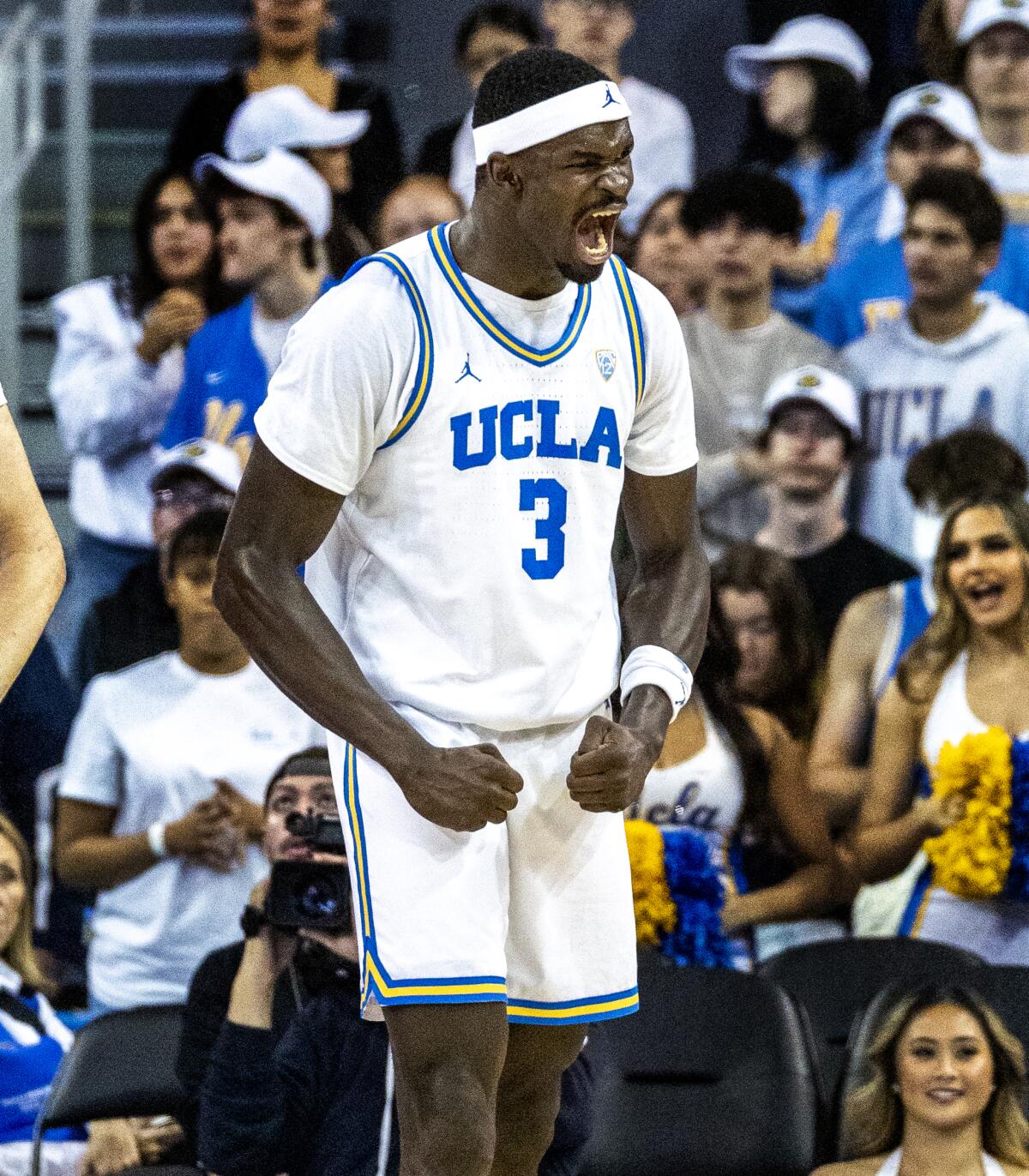 UCLA forward Adem Bona celebrates after a dunk against Oregon State on Thursday.