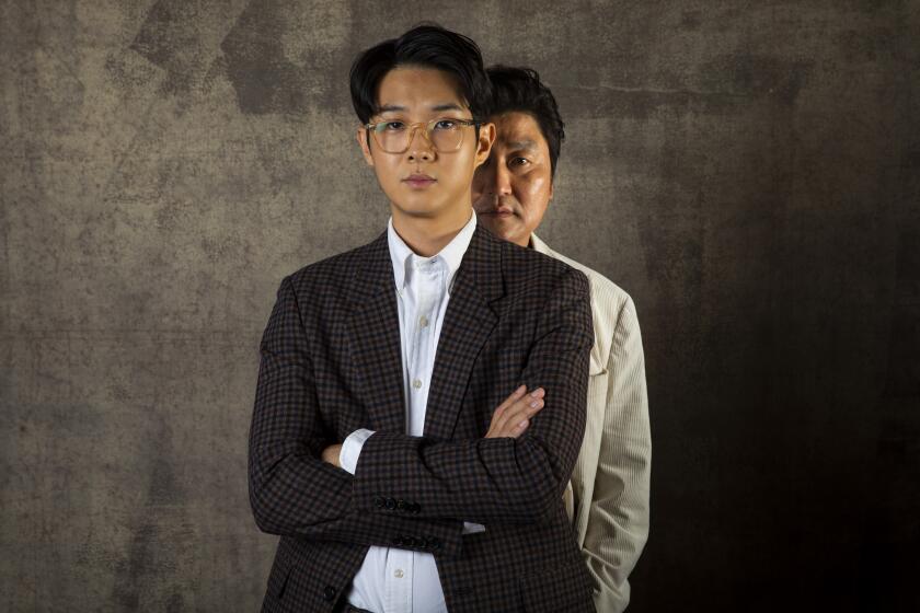TORONTO, ONT., CAN -- SEPTEMBER 07, 2019-- Actors Choi Woo Shik and Song Kang Ho, from the film "Parasite," photographed in the L.A. Times Photo Studio at the Toronto International Film Festival, in Toronto, Ont., Canada on September 07, 2019. (Jay L. Clendenin / Los Angeles Times)