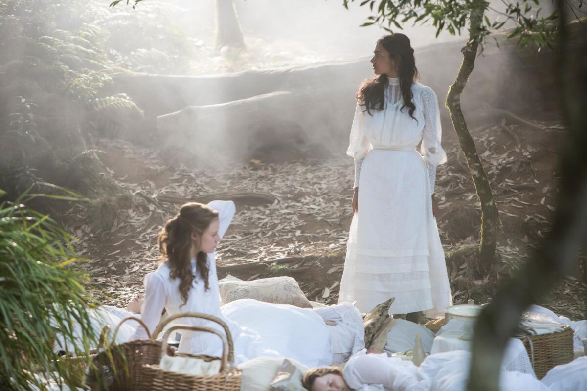Lily Sullivan, left, as Miranda and Madeleine Madden as Marion in a scene from "Picnic at Hanging Rock."