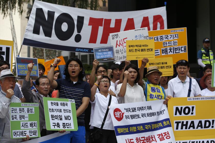 South Koreans near the U.S. Embassy in Seoul rally against the deployment of the Terminal High-Altitude Area Defense, or THAAD, on July 11, 2016.