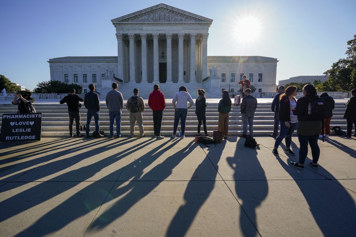 Anti-abortion activists with "Bound 4 Life" demonstrate at the Supreme Court in Washington, Monday, Oct. 5, 2020, as the justices begin a new term without the late Justice Ruth Bader Ginsburg. (AP Photo/J. Scott Applewhite)