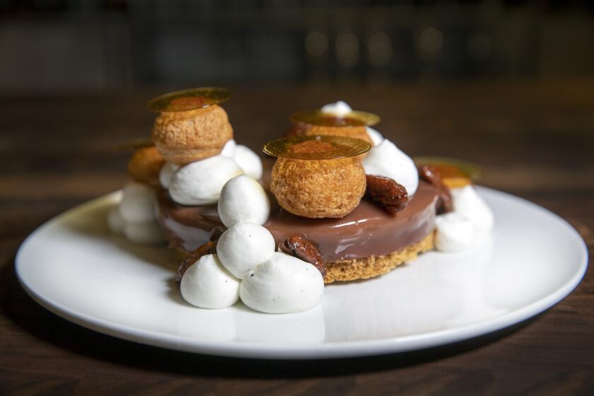 LOS ANGELES, CALIF. -- MONDAY, AUGUST 19, 2019: Detail of St. Honore dessert at Bons Temps, a modern American restaurant in downtown Los Angeles, Calif., on Aug. 19, 2019. (Allen J. Schaben / Los Angeles Times)