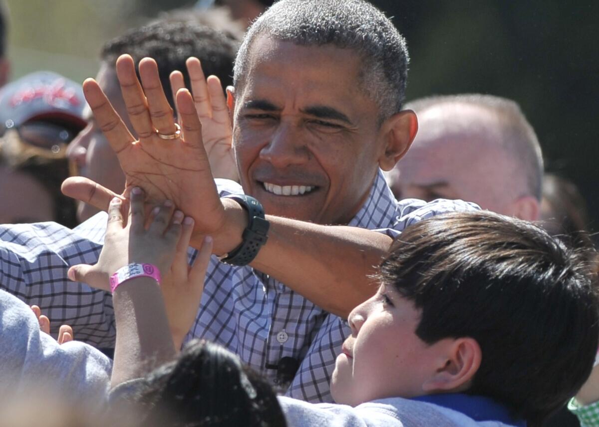 President Obama, seen here at the annual White House Easter Egg Roll on Monday, assembled an electoral coalition heavily reliant on minorities and whites with college degrees. Newly released data shows how much that coalition differs from the GOP's backers.