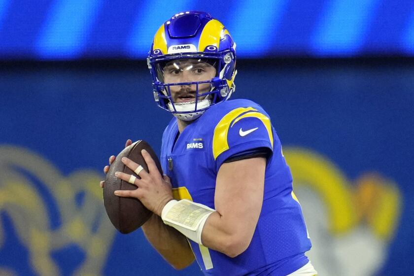 Los Angeles Rams quarterback Baker Mayfield prepares to throw during the second half.