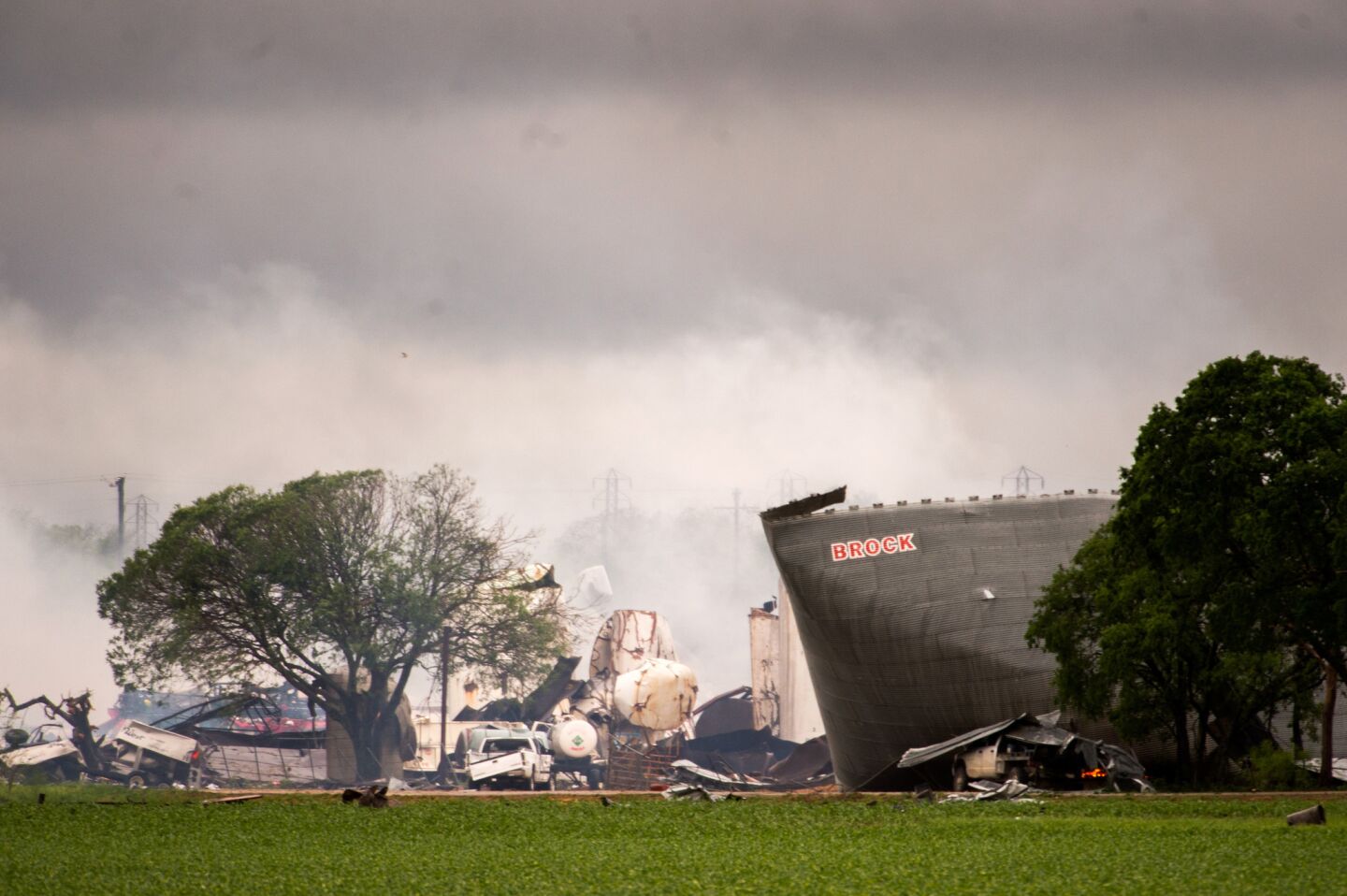 The remains of the the West Fertilizer Co. plant smolder in the rain on Thursday in West, Texas.
