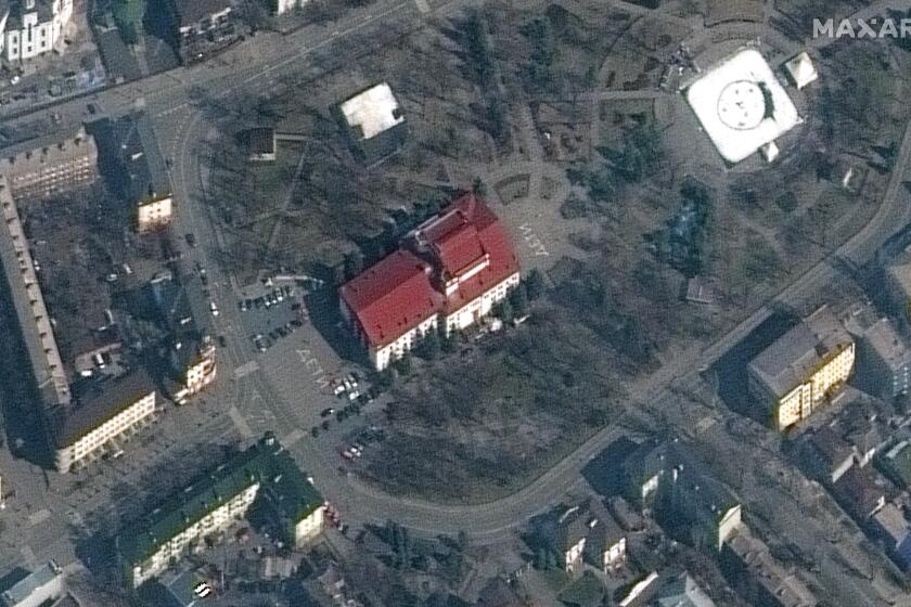 This satellite image provided by Maxar Technologies shows the Mariupol Drama Theater in Mariupol