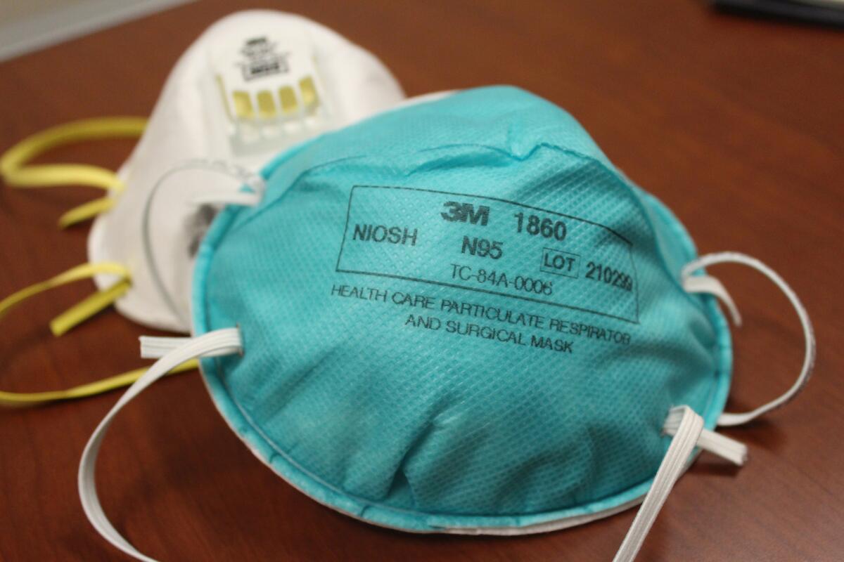 Some health care experts recommend the use of N95 respirator masks to help protect against wildfire smoke. Simple dust or surgical masks do not offer the same kind of protection, they warn. (Ana B. Ibarra/California Healthline)