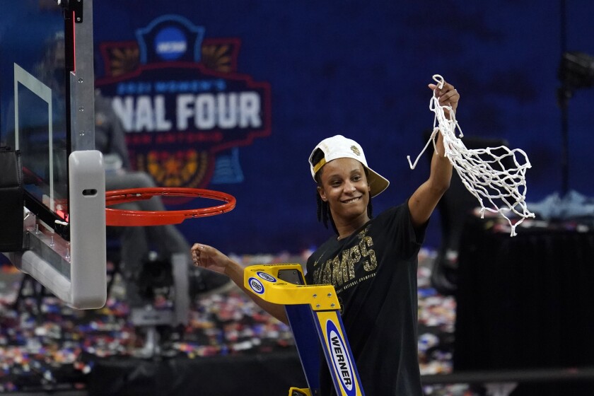 Stanford guard Kiana Williams (23) cuts down the net after the championship game against Arizona in the women's Final Four NCAA college basketball tournament, Sunday, April 4, 2021, at the Alamodome in San Antonio. Stanford won 54-53. (AP Photo/Eric Gay)
