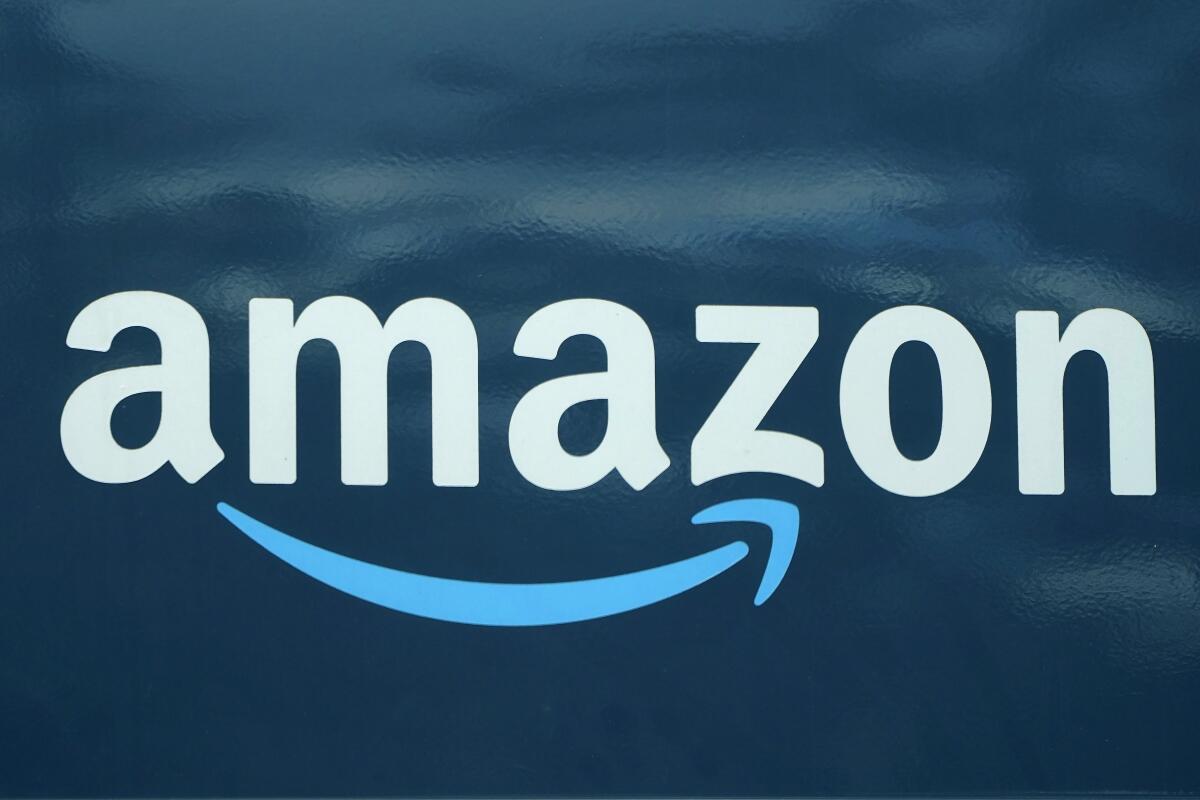 The word Amazon with a blue curved arrow underneath it.
