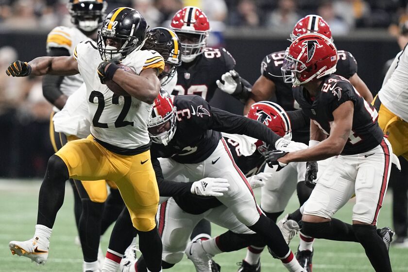 Pittsburgh Steelers running back Najee Harris (22) runs against the Atlanta Falcons during the second half of an NFL football game, Sunday, Dec. 4, 2022, in Atlanta. (AP Photo/Brynn Anderson)