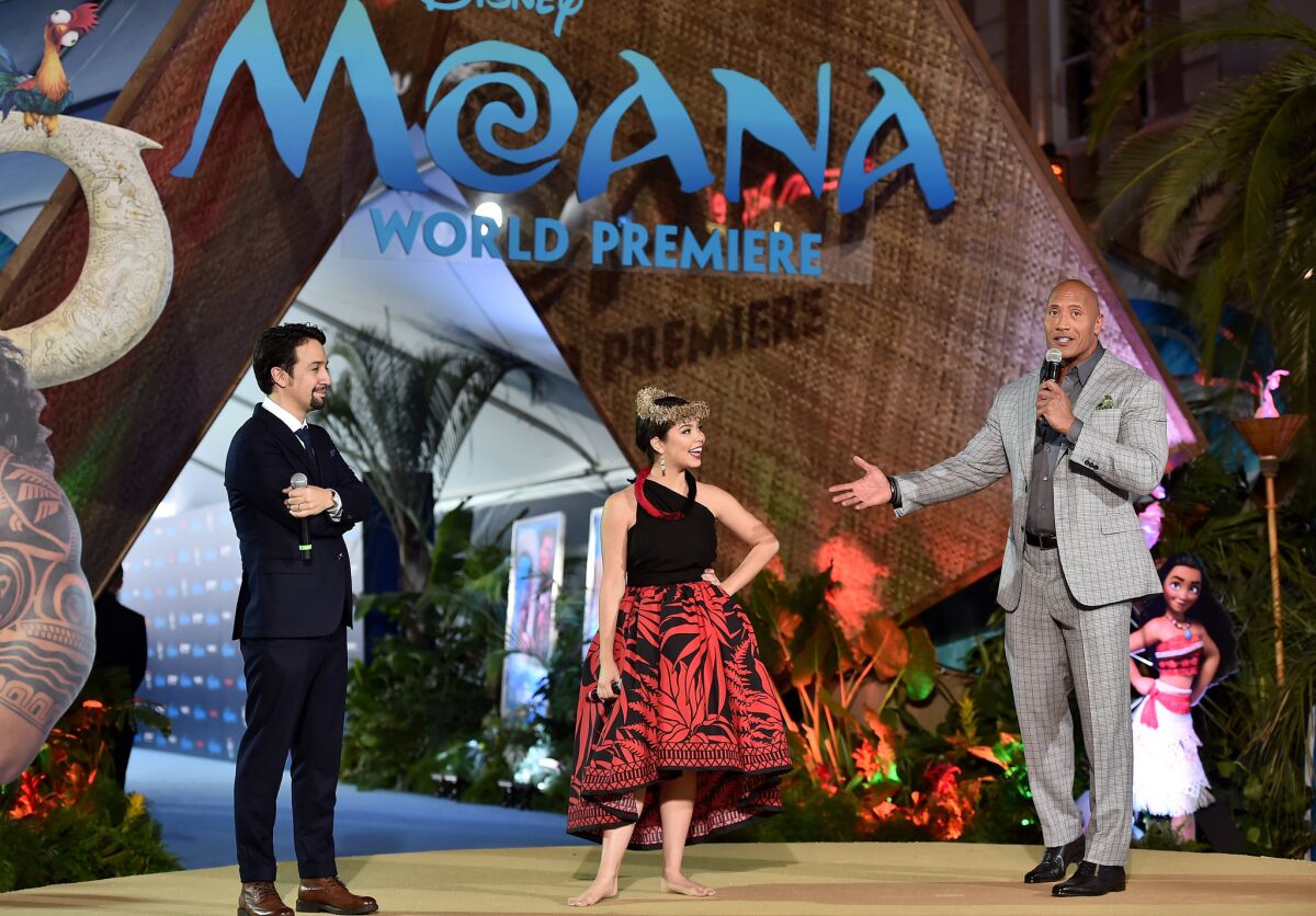 Onstage at Hollywood's El Capitan Theatre for the Nov. 14 world premiere of Disney's "Moana," from left, Lin-Manuel Miranda, Auli'i Cravalho and Dwayne Johnson.