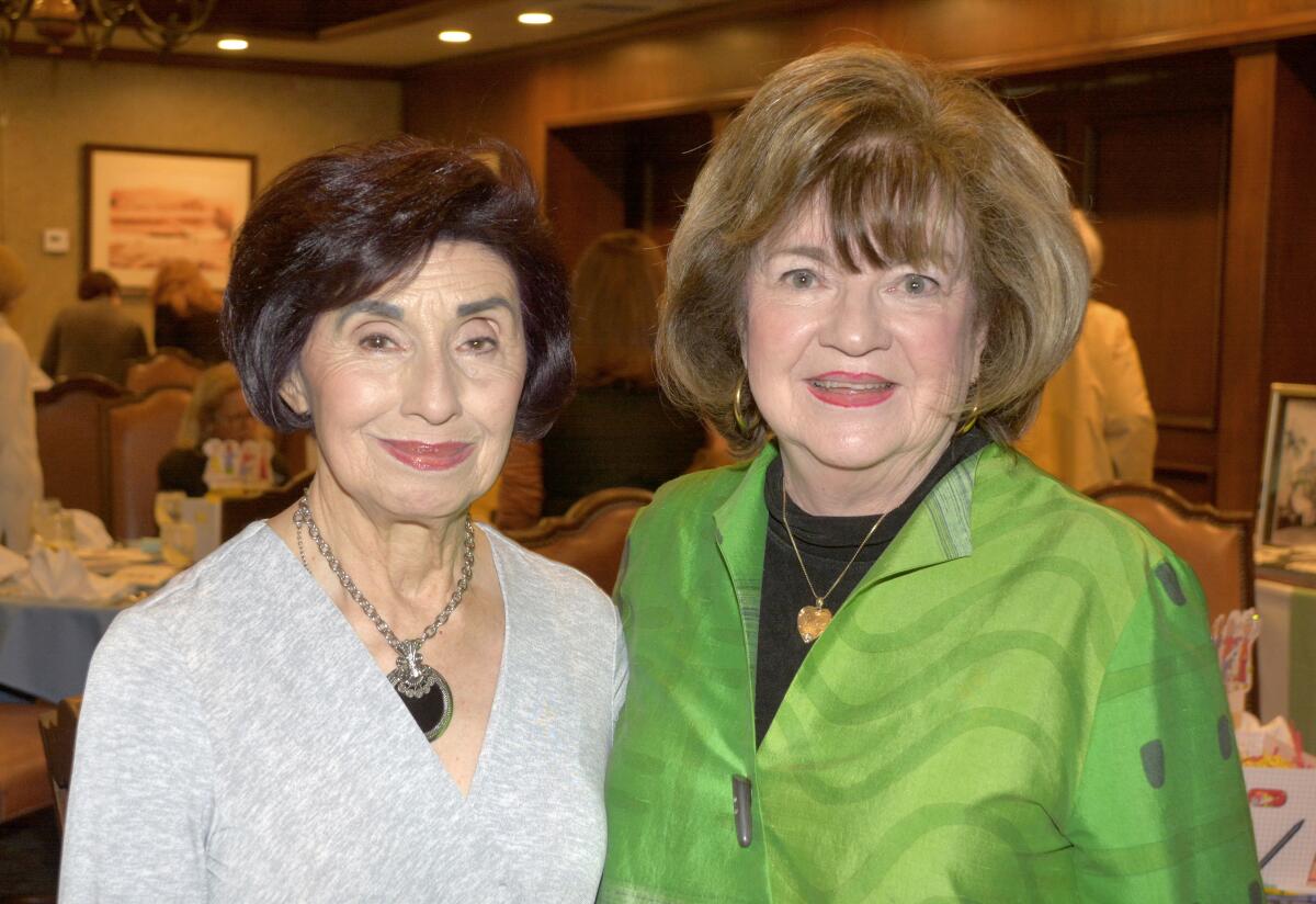 Rosemarie Witten, left, who serves as the guild's thrift shop chairwoman, with Veronica Chavoor who handled reservations for Saturday's event.