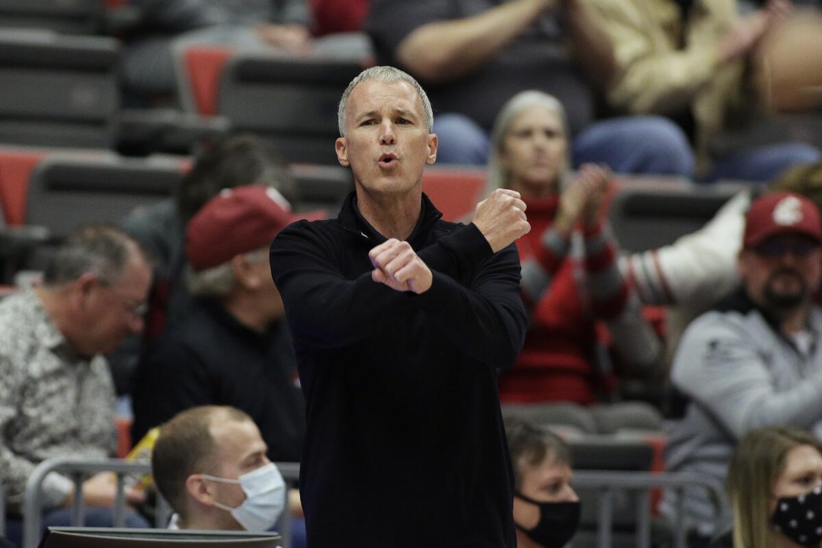 USC coach Andy Enfield directs his team during the second half of an NCAA college basketball game against Washington State