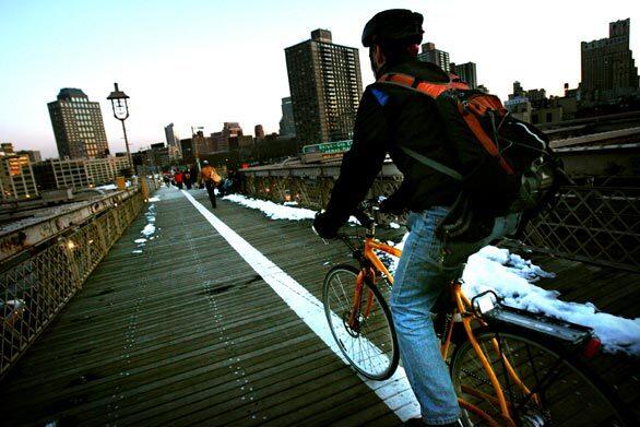 Bicyclist Gary Eckstein, 45, travels between home and work over the Brooklyn Bridge. More New York commuters are opting for just two wheels. And while there is a certain safety in numbers, they must navigate anarchic traffic conditions.