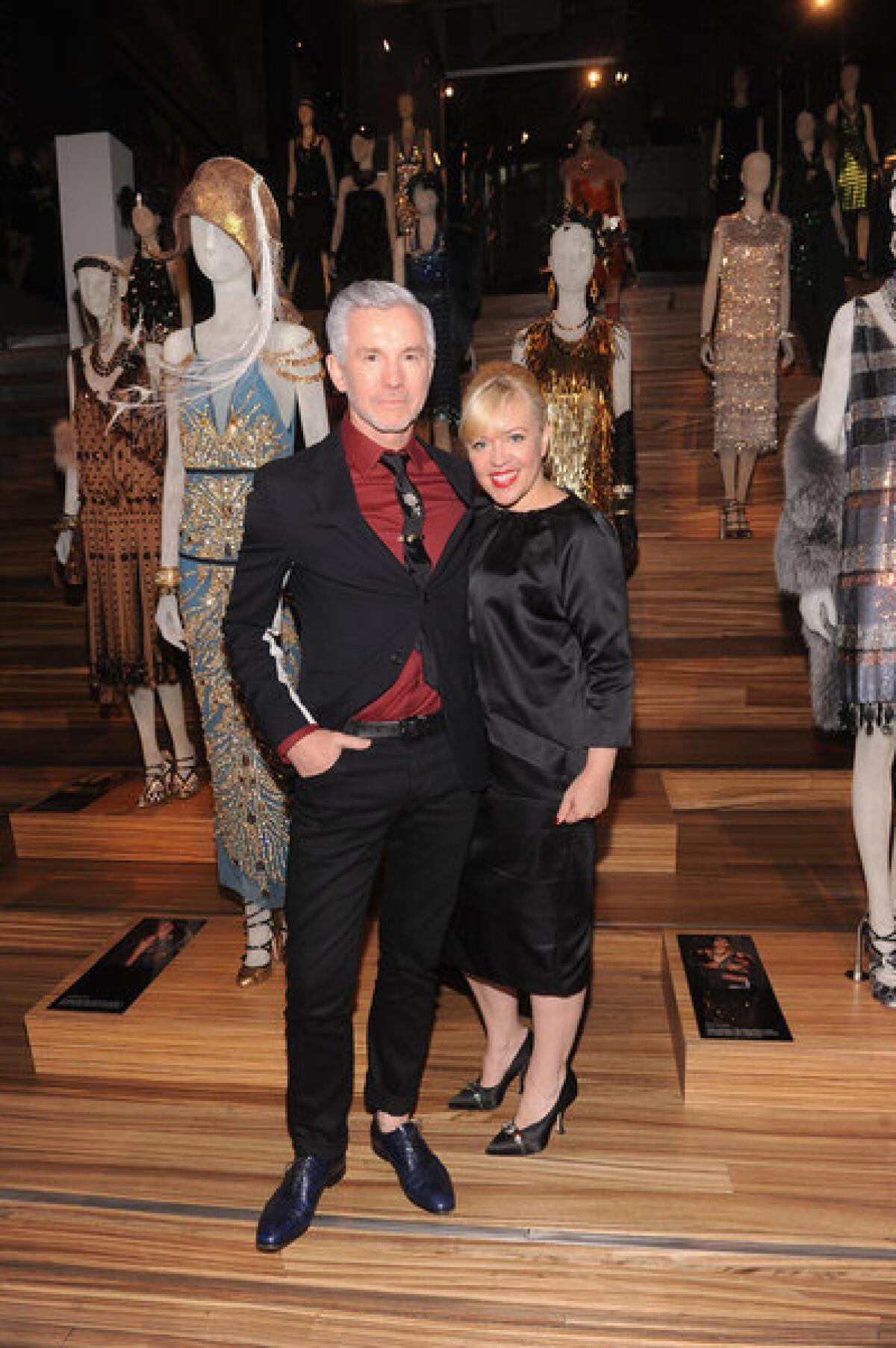 Baz Luhrmann, director/producer/co-writer of 'The Great Gatsby' and Catherine Martin, Academy Award-winning costume and production designer, at the "Gatsby" cocktail party and costume exhibit.