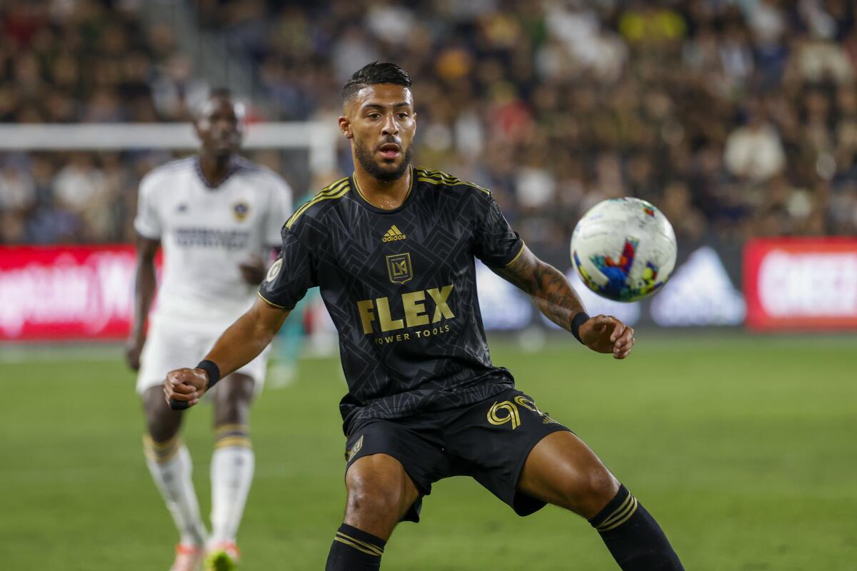 LAFC forward Denis Bouanga controls the ball against the Galaxy during an MLS playoff match.