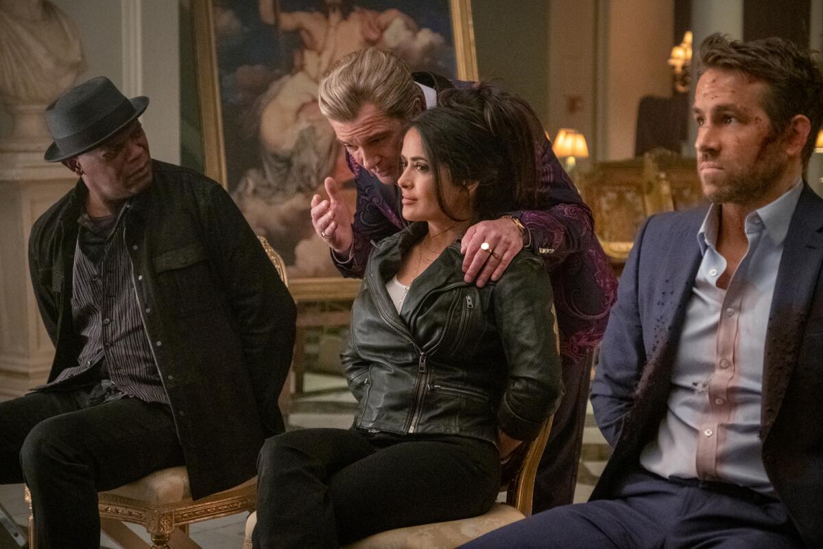Samuel L. Jackson, Antonio Bandera, Salma Hayek and Ryan Reynolds in the the movie "The Hitman's Wife's Bodyguard."