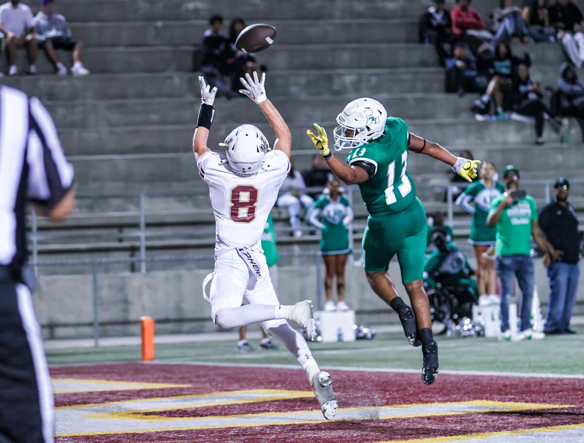 Brett DeBergh of JSerra makes a leaping touchdown grab in the second half against San Diego Lincoln.