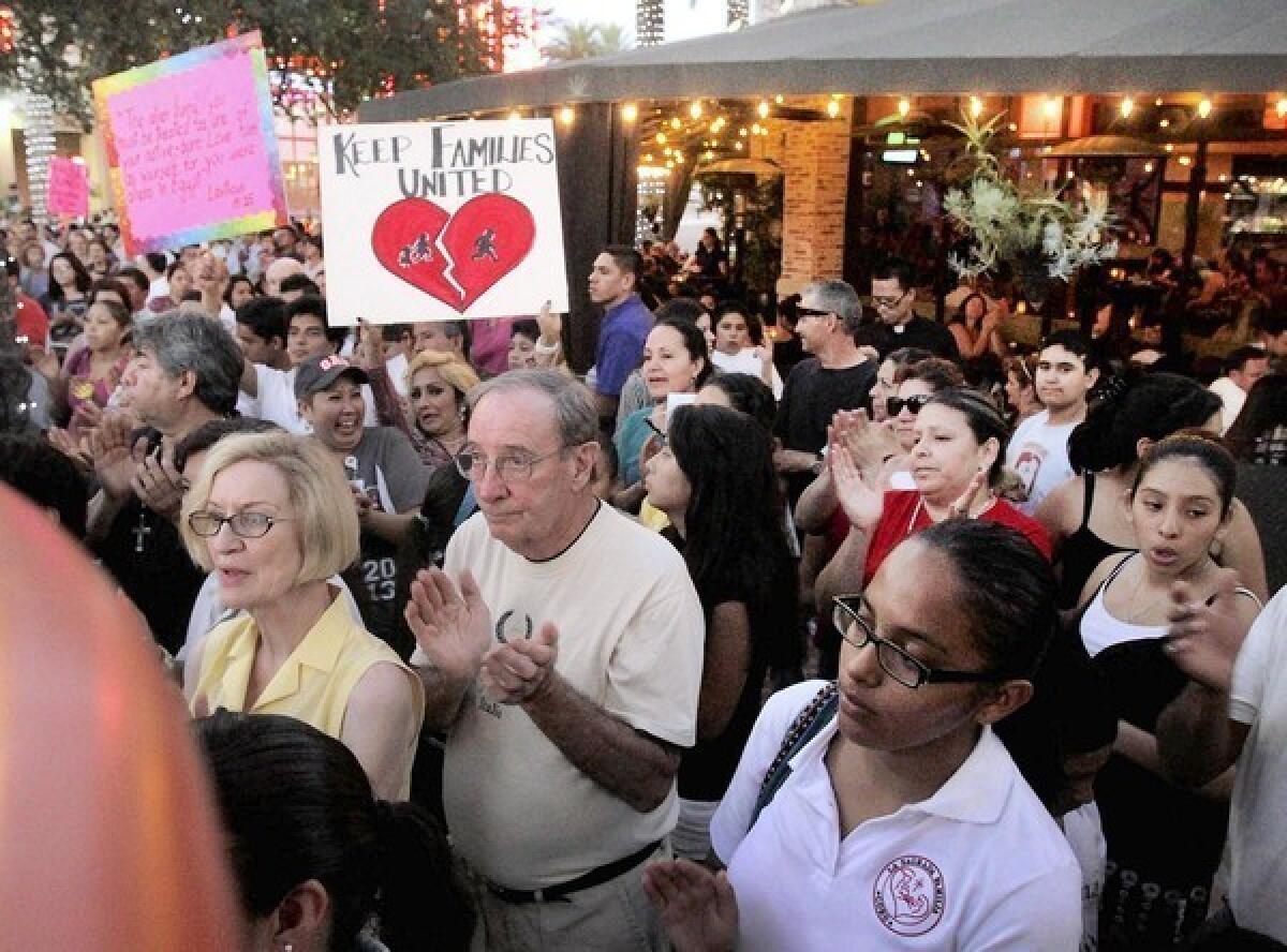 Roman Catholics from Los Angeles and Orange counties march last month in Brea in support of immigration reform. For the month of September, clergy have been urged to address the issue from the pulpit.