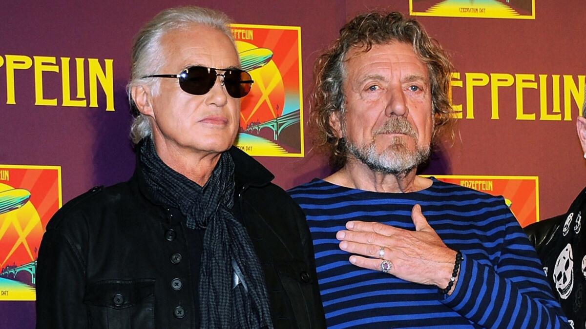 Led Zeppelin guitarist Jimmy Page, left, and singer Robert Plant, seen in 2012. A federal appeals court on Friday ordered a new trial to decide whether Led Zeppelin had stolen portions of another band's work to create the legendary hit "Stairway to Heaven."