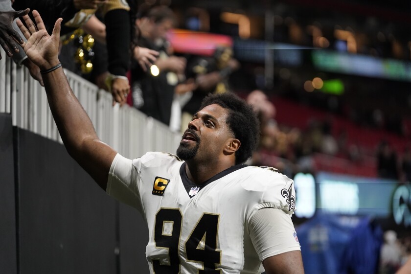 New Orleans Saints defensive end Cameron Jordan (94) greets fans after an NFL football game against the Atlanta Falcons, Sunday, Jan. 9, 2022, in Atlanta. The New Orleans Saints won 30-20. (AP Photo/Brynn Anderson)