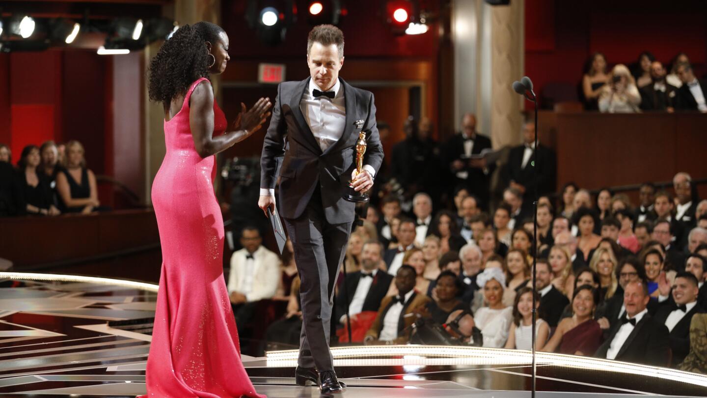 Sam Rockwell after winning best supporting actor in "Three Billboards Outside Ebbing, Missouri" with presenter Viola Davis, from backstage at the 90th Academy Awards on Sunday at the Dolby Theatre in Hollywood.