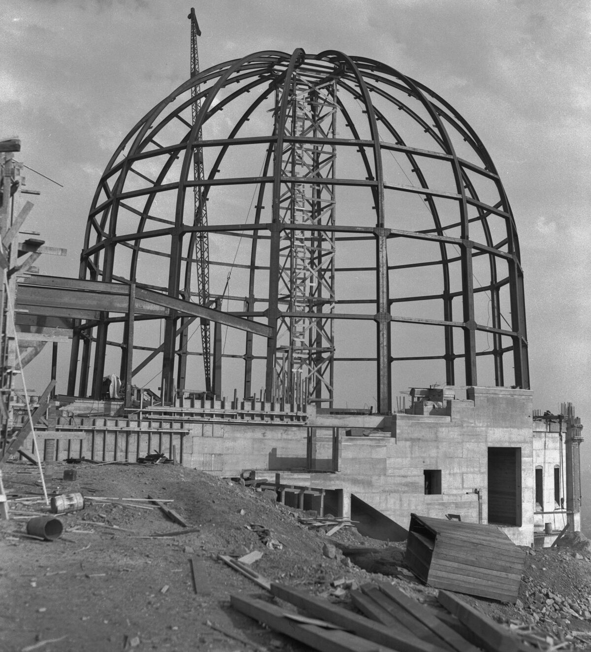 A metal and concrete structure under construction.
