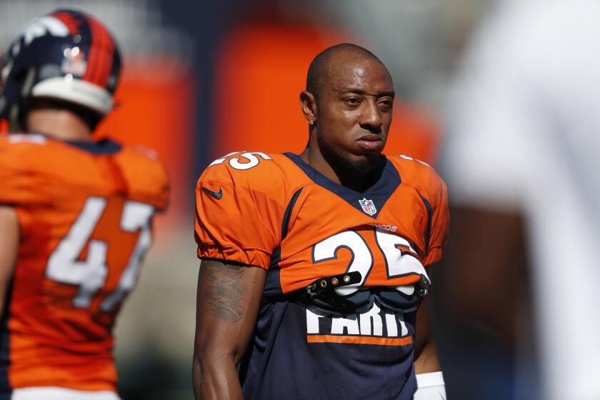 FILE - In this Aug. 5, 2019, file photo, Denver Broncos cornerback Chris Harris (25) takes part in drills during an NFL football training camp session in Englewood, Colo. Veteran cornerback Harris is about to test unfettered free agency for the first time in his nearly decade-long career. (AP Photo/David Zalubowski, File)