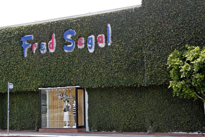 The iconic ivy-covered exterior of the Fred Segal center at 8100 Melrose Avenue in a July 2014 file photo. On March 11, 2016, the poperty was sold to a Canadian retail real estaste investment company for a reported $43 million/