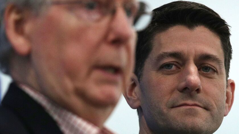 U.S. Speaker of the House Rep. Paul Ryan (R-WI) (R) and Senate Majority Leader Sen. Mitch McConnell (R-KY) (L) hold a news briefing during the 2018 House & Senate Republican Member Conference February 1, 2018 .