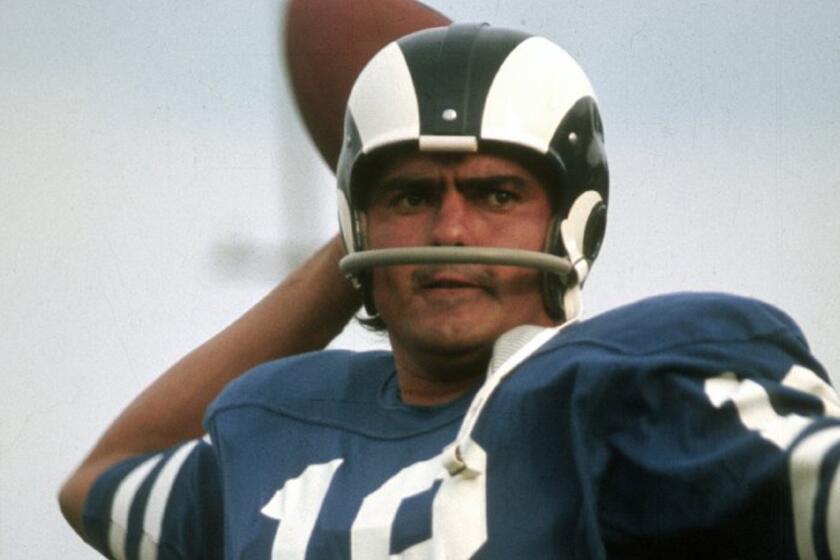 Quarterback Roman Gabriel was selected by the Los Angeles Rams with the second overall pick in 1962.
