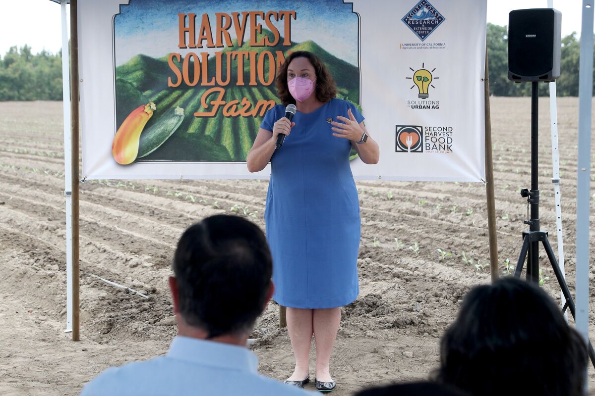 U.S. Rep. Katie Porter (D-Irvine) speaks during a news conference at Second Harvest's new farm in Irvine.