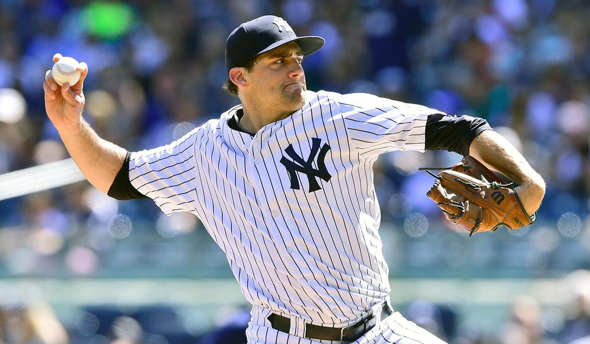 New York Yankees pitcher Nathan Eovaldi pitches against the Tampa Bay Rays during the first inning on Saturday.