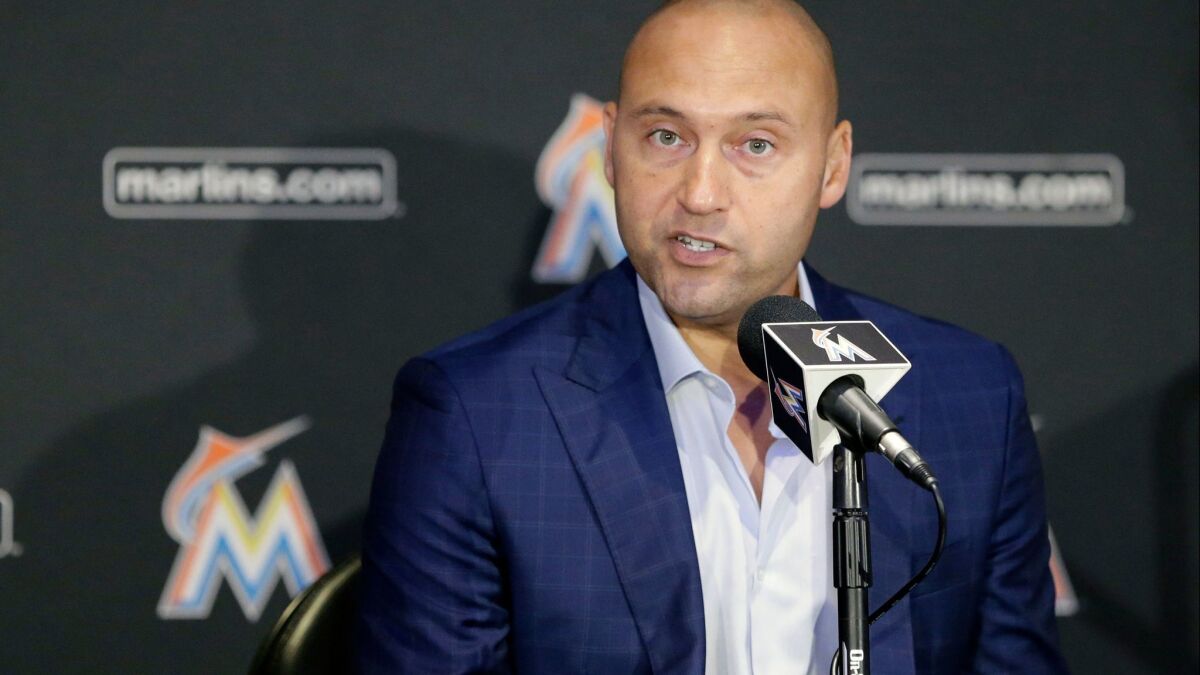 Miami Marlins owner Derek Jeter talks to reporters during a news conference, Tuesday, Oct. 3, 2017, in Miami. Jeter says he will help develop a winning culture with the Marlins that will emphasize hard work, discipline and no excuses.