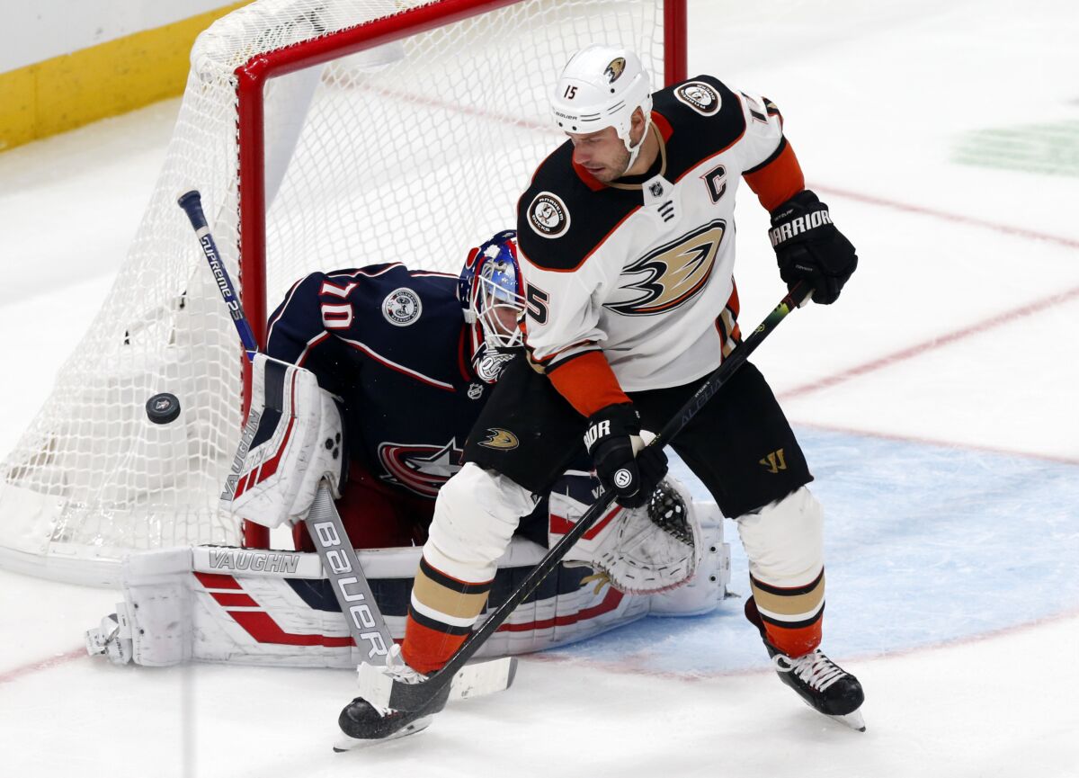 A third-period shot attempt by Ducks forward Ryan Getzlaf is stopped by Blue Jackets goalie Joonas Korpisalo.