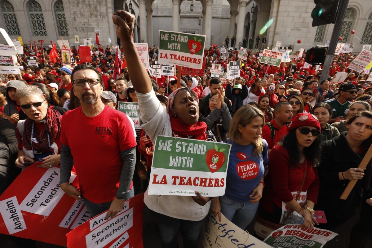 Teachers in the Los Angeles Unified School district rally during their strike in January. Attempts to change California charter school policy often fall into a debate between teachers unions and wealthy charter school benefactors.