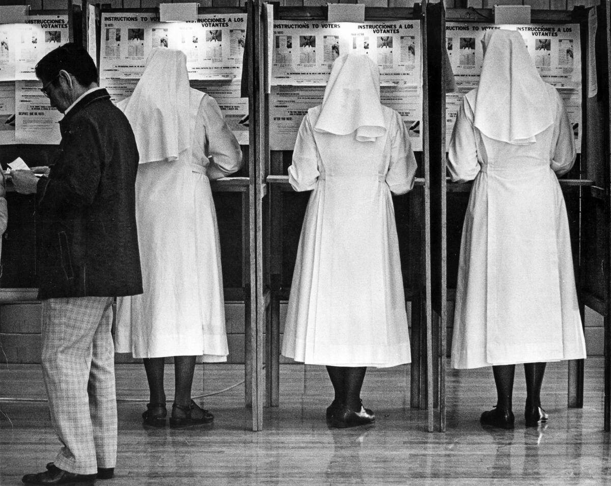 Nov. 2, 1976: Nuns from the Little Sisters of the Poor vote early in the morning at an East 1st Street polling place.