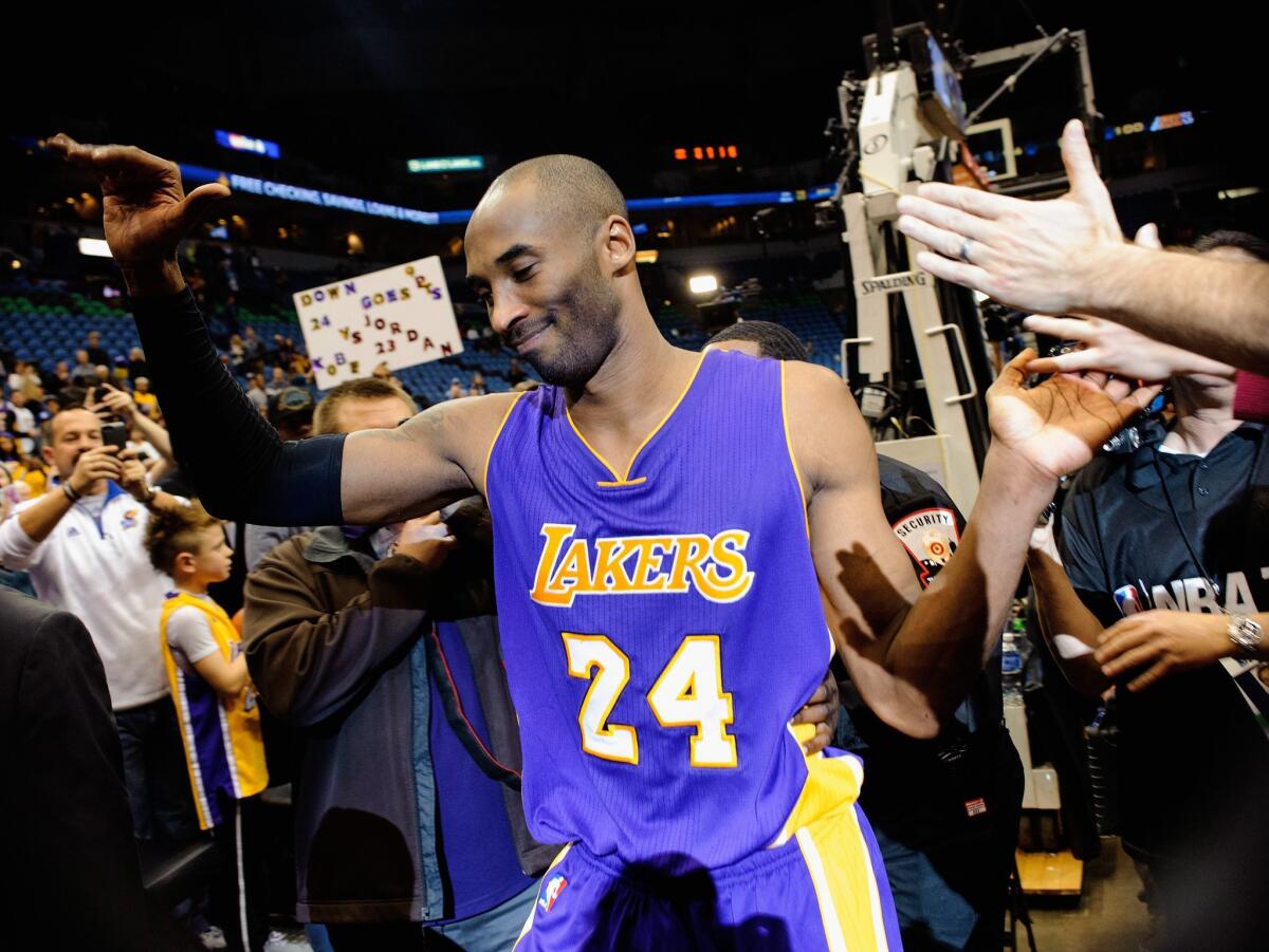 Kobe Bryant, pictured in December 2014, created the book “The Wizenard Series: Season One,” which was released Tuesday, about two months after his death.