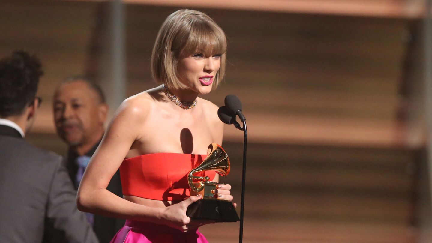Taylor Swift accepts the award for album of the year for "1989."