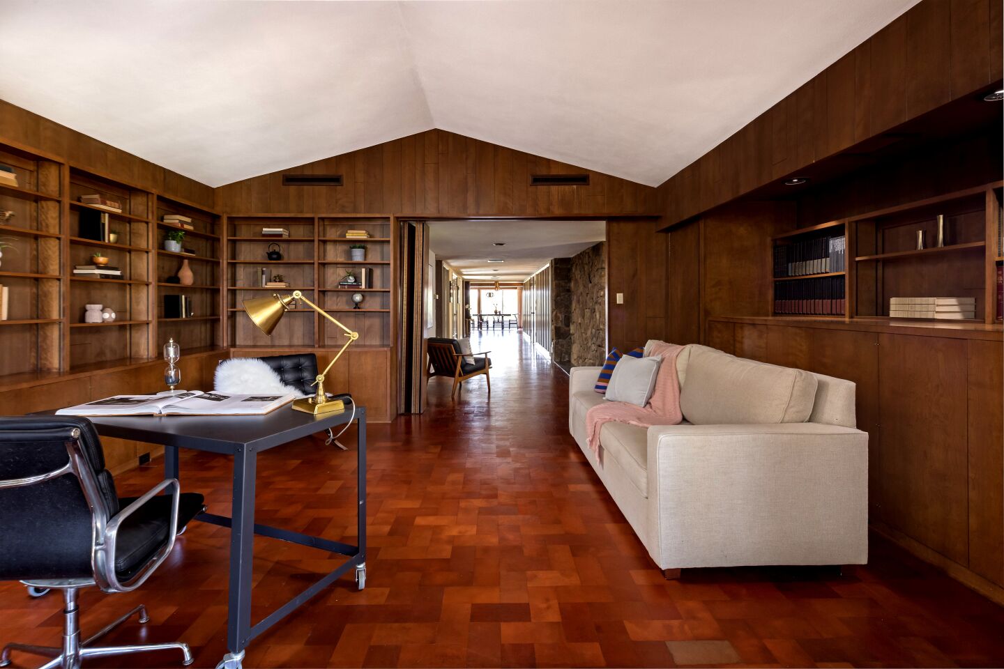 Leather floors. Wood built-ins. It's easy to feel groovy here.