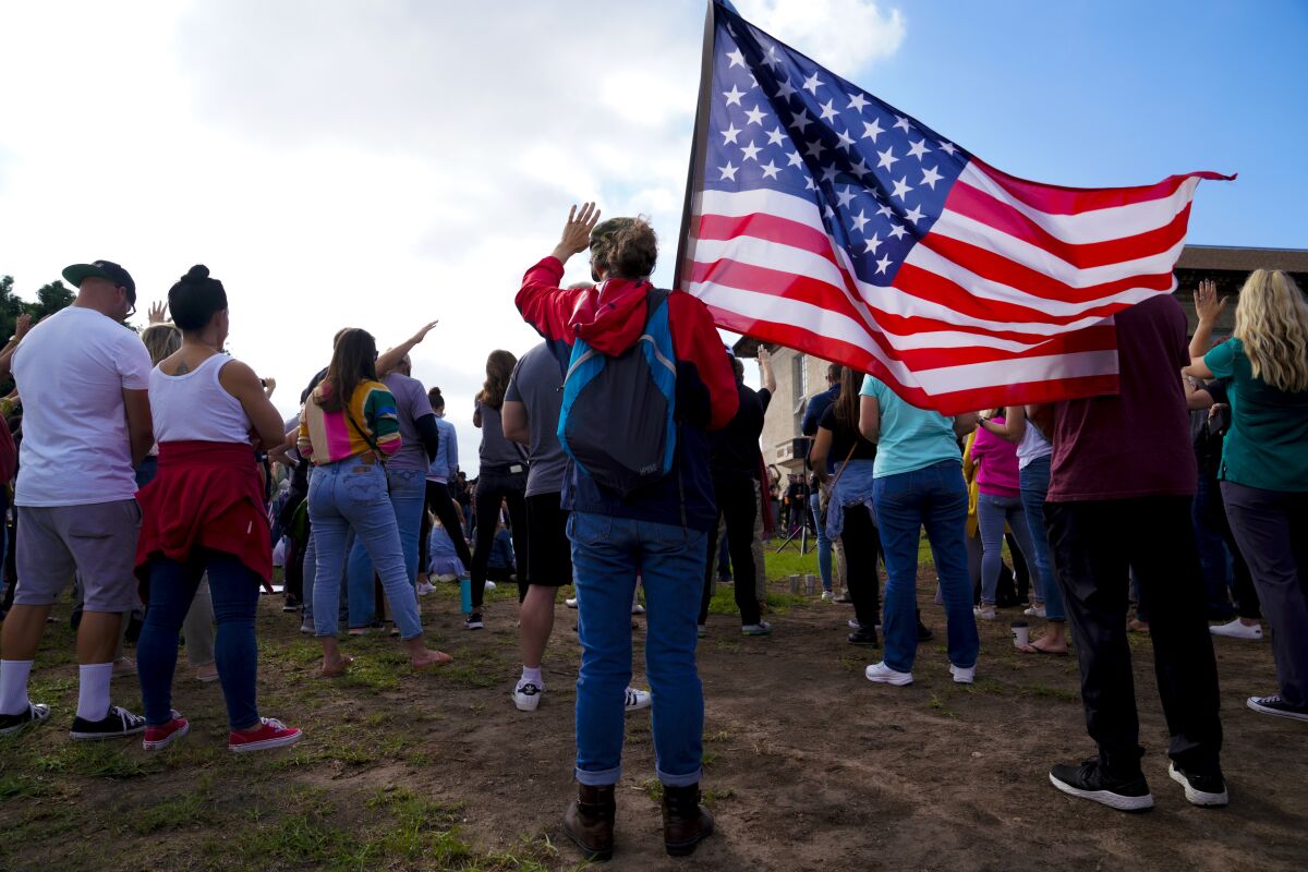 Protesters rally against San Diego Unified's student vaccination mandate Sept. 28.