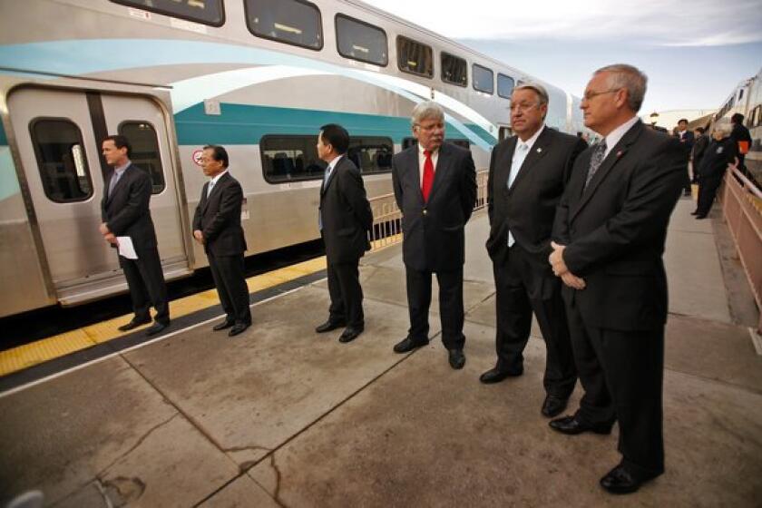 Metrolink officials unveil a new train car built by South Korean firm Hyundai in 2010.