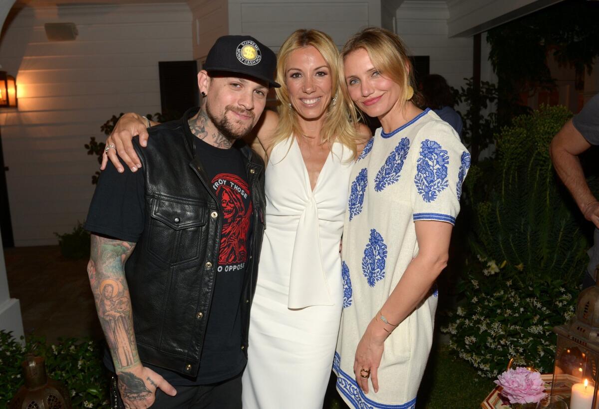 Actress Cameron Diaz, right, and musician Benji Madden, shown in May with author Vicky Vlachonis.