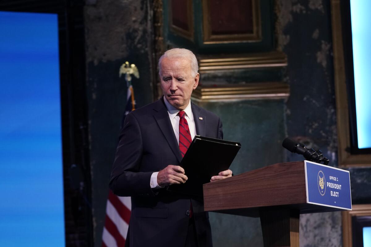 President-elect Joe Biden leaves after speaking on Friday in Wilmington, Del.