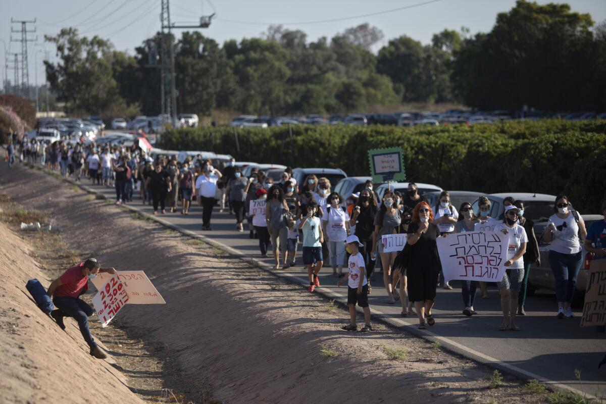 Israeli social workers protest the country's economic situation July 10.