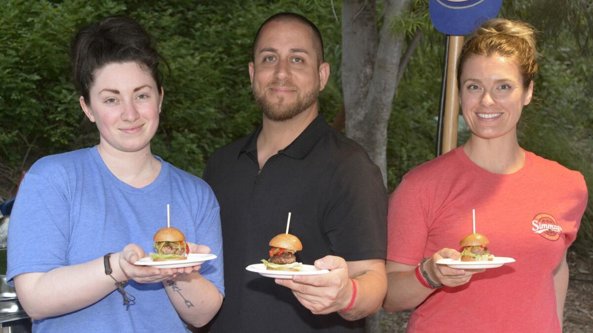 Among the restaurants that participated in last week's Beastly Ball were Burbank's Simmzy's represented by Rachel Gerdeman, from left, Adam Pascale and Rachel Guess.
